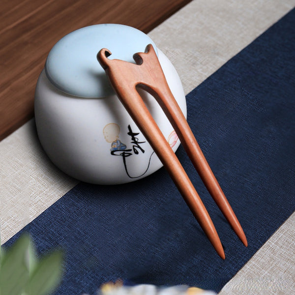 brown wooden hair pin